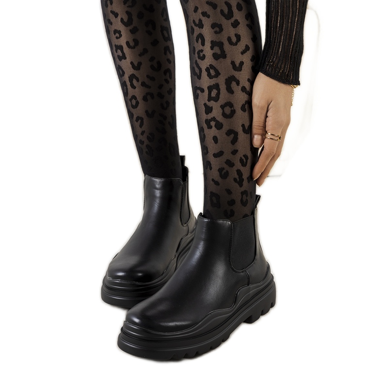 Botas negras en la plataforma Tausel negro Botas negras en la plataforma Tausel negro