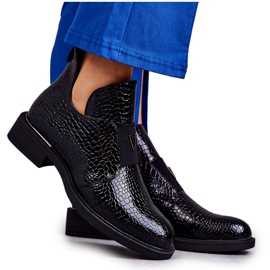 Vinceza Botas lacadas con recortes en un tacón plano Negro Eunice Vinceza Botas lacadas con recortes en un tacón plano Negro Eunice