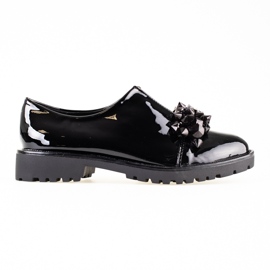 Zapatos lacados de mujer en la plataforma Shelovet. negro