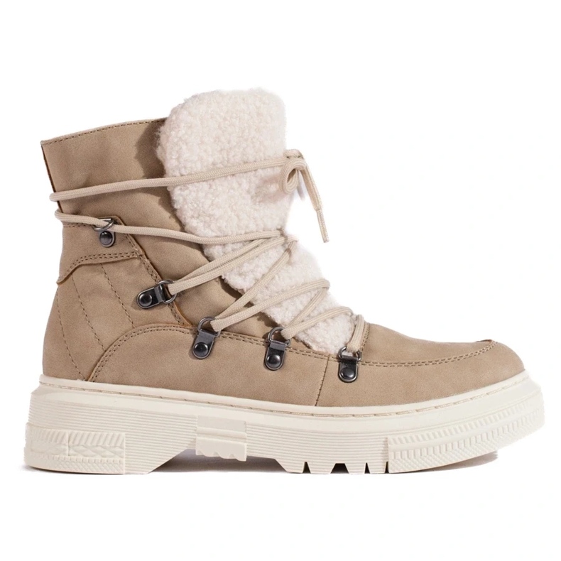 Botas de nieve de mujer beige con piel de oveja.