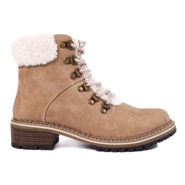 Botas de piel de oveja beige para mujer.