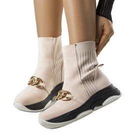 Botas aislantes beige con cadena Ulster