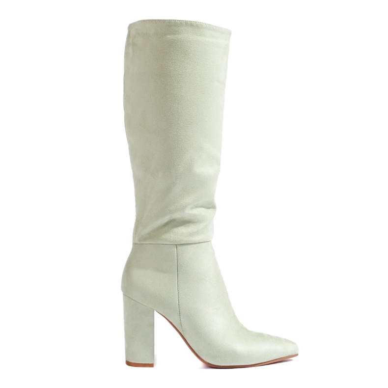 Botas de mujer fabricadas en ante ecológico. verde