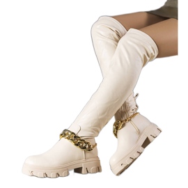 Botas beige de suela alta de Zarate.