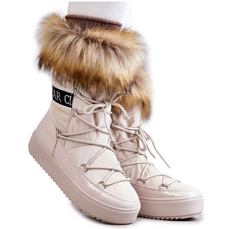 Botas de nieve con ataduras de beige de las mujeres