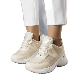 Zapatillas beige con inserciones metálicas de Ruais Zapatillas beige con inserciones metálicas de Ruais