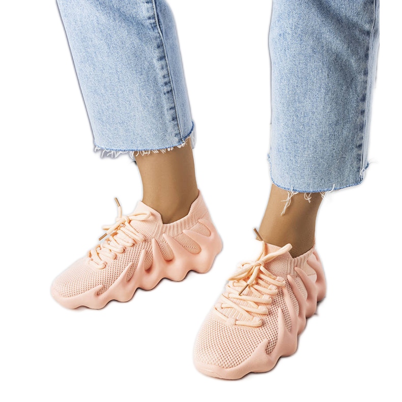Zapatillas vaporosas rosas de Muriel. rosado