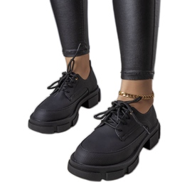 Zapatos negros con suela maciza de Kay