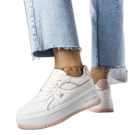 Zapatillas blancas y rosas en la plataforma Lepage blanco