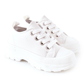 Zapatillas para niños en la plataforma blanca blanco