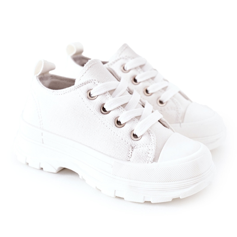 Zapatillas para niños en la plataforma blanca blanco