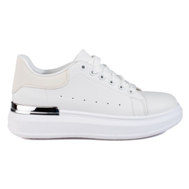 Zapatos deportivos de mujer en una plataforma alta Shelovet blanco.