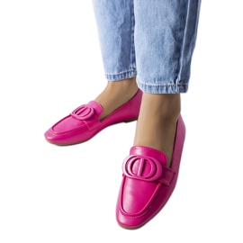 Mocasines rosas con hebilla de Poissonnier.