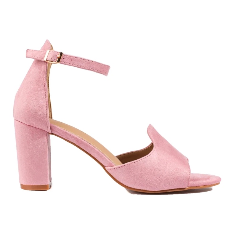 Sandalias rosas de mujer en el poste de W. Potocki rosado