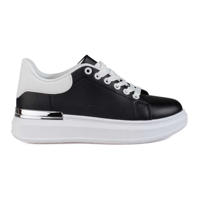 Zapatos deportivos de mujer en una plataforma alta Shelovet en blanco y negro.