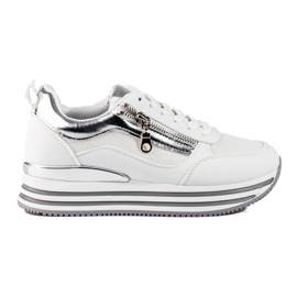 Zapatillas blancas y plateadas en la plataforma Shelovet. blanco