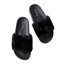 Chanclas negras con pelo marfil negro