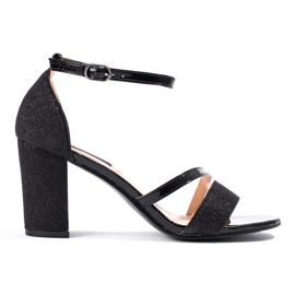 Sandalias negras con purpurina de Shelovet. negro