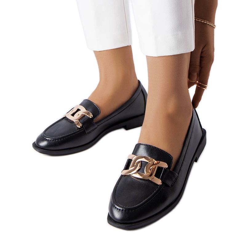 Mocasines negros con hebilla de Henrique