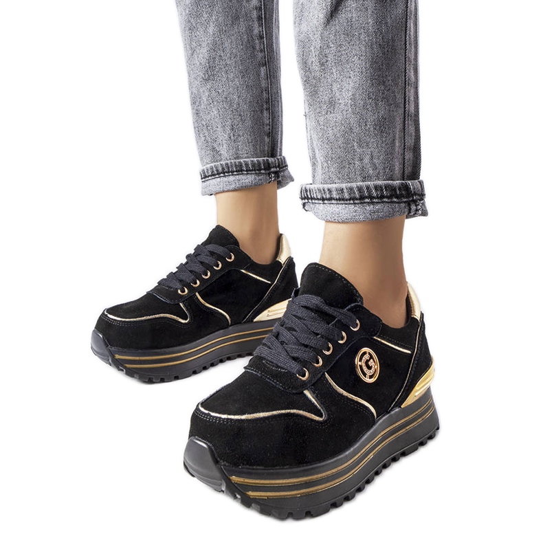 Zapatillas con plataforma negras y doradas de Therrien negro