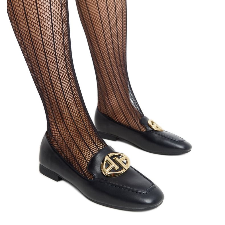 Mocasines negros con detalles dorados de Bergeron