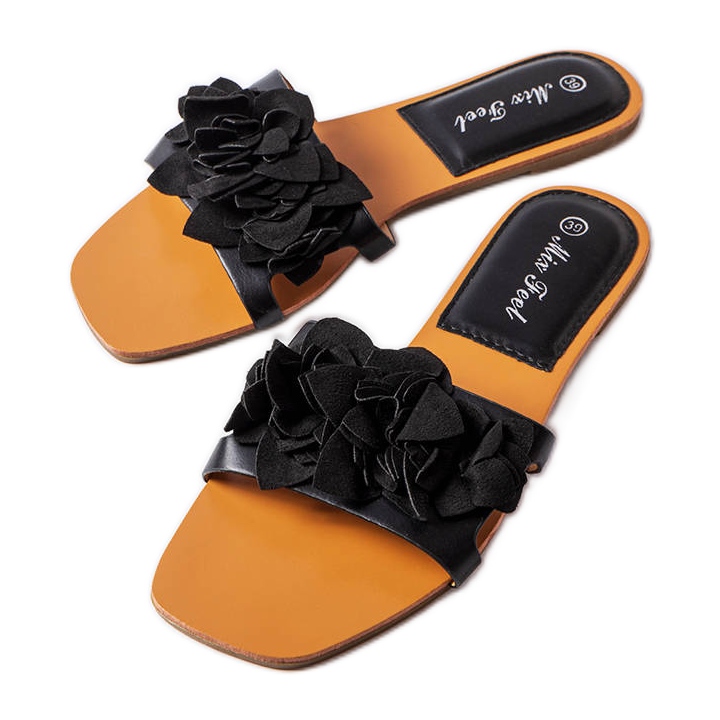 Chanclas negras decoradas con flores de Rapids negro Chanclas negras decoradas con flores de Rapids negro