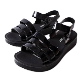 Sandalias de cuña lacadas en negro de Covillon