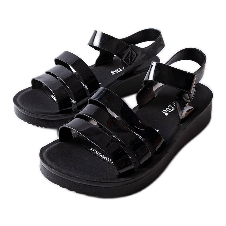 Sandalias de cuña lacadas en negro de Covillon