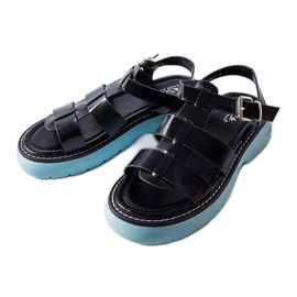 Sandalias negras sobre plataforma azul de Lola negro