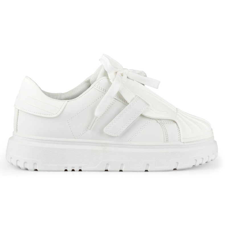 Zapatos deportivos de mujer blancos de moda.