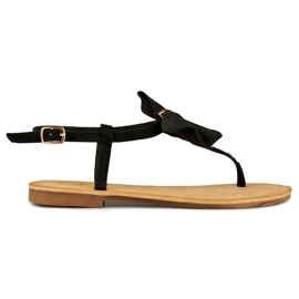 Sandalias de mujer negras con lazo. negro