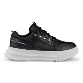 Deportivas de mujer negras con suela blanca. negro
