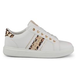 Deportivas blancas de mujer con un delicado adorno blanco