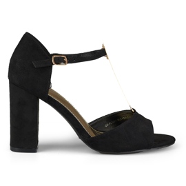 Elegantes sandalias de tacón alto con decoración dorada negro