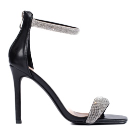Sandalias elegantes en un tacón alto Shelovet negro.