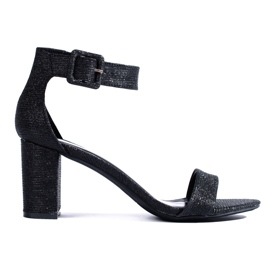 Sandalias negras con purpurina de Shelovet. negro