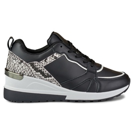 Zapatos de mujer negros con cordones y cuña baja