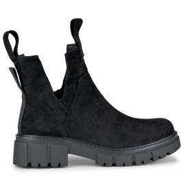 Botas negras de mujer en la plataforma. negro
