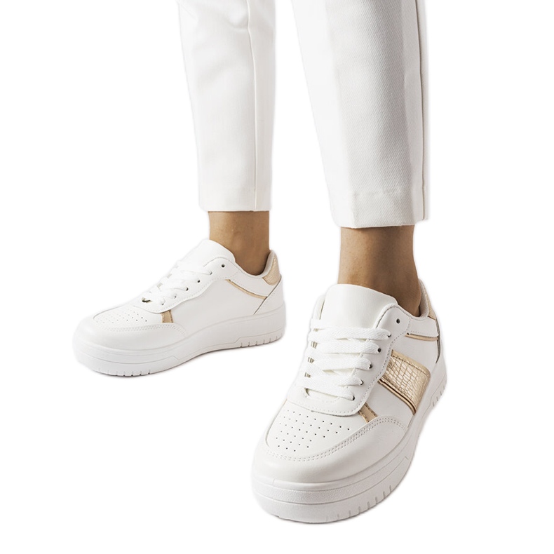 Zapatillas deportivas blancas y doradas de Parma. blanco