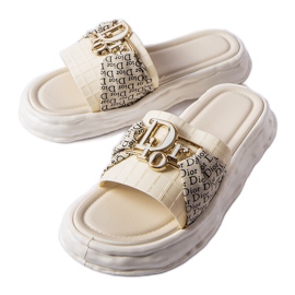 Chanclas decorativas de goma beige de Bérard