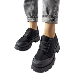 Zapatos negros con suela Pointe maciza.
