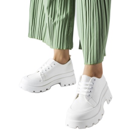 Zapatos blancos con suela Pointe maciza.