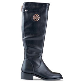 Botines de mujer con cremallera dorada. negro