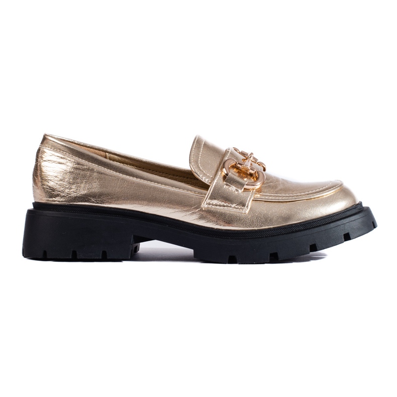 Mocasines Shelovet dorados con suela gruesa.