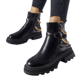 Botines negros con cadenas decorativas de Bonenfant