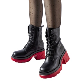 Zapatos aislantes negros con tacón rojo Costo