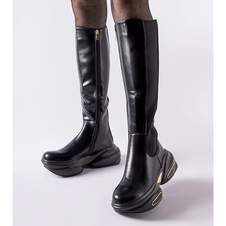 Inna Botas Tanas negras con suela maciza. negro