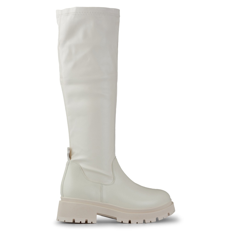Botas de mujer elásticas beige confeccionadas en ecopiel. Botas de mujer elásticas beige confeccionadas en ecopiel.