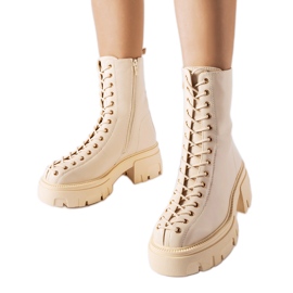 Botas bovver con aislamiento beige decoradas con ribete Amla