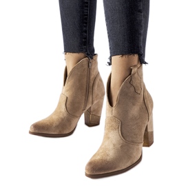 Botas cowboy aislantes con aberturas beige de Brunilde